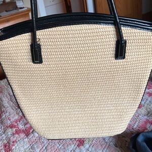 Vinyl cream straw pattern purse with black faux leather accents